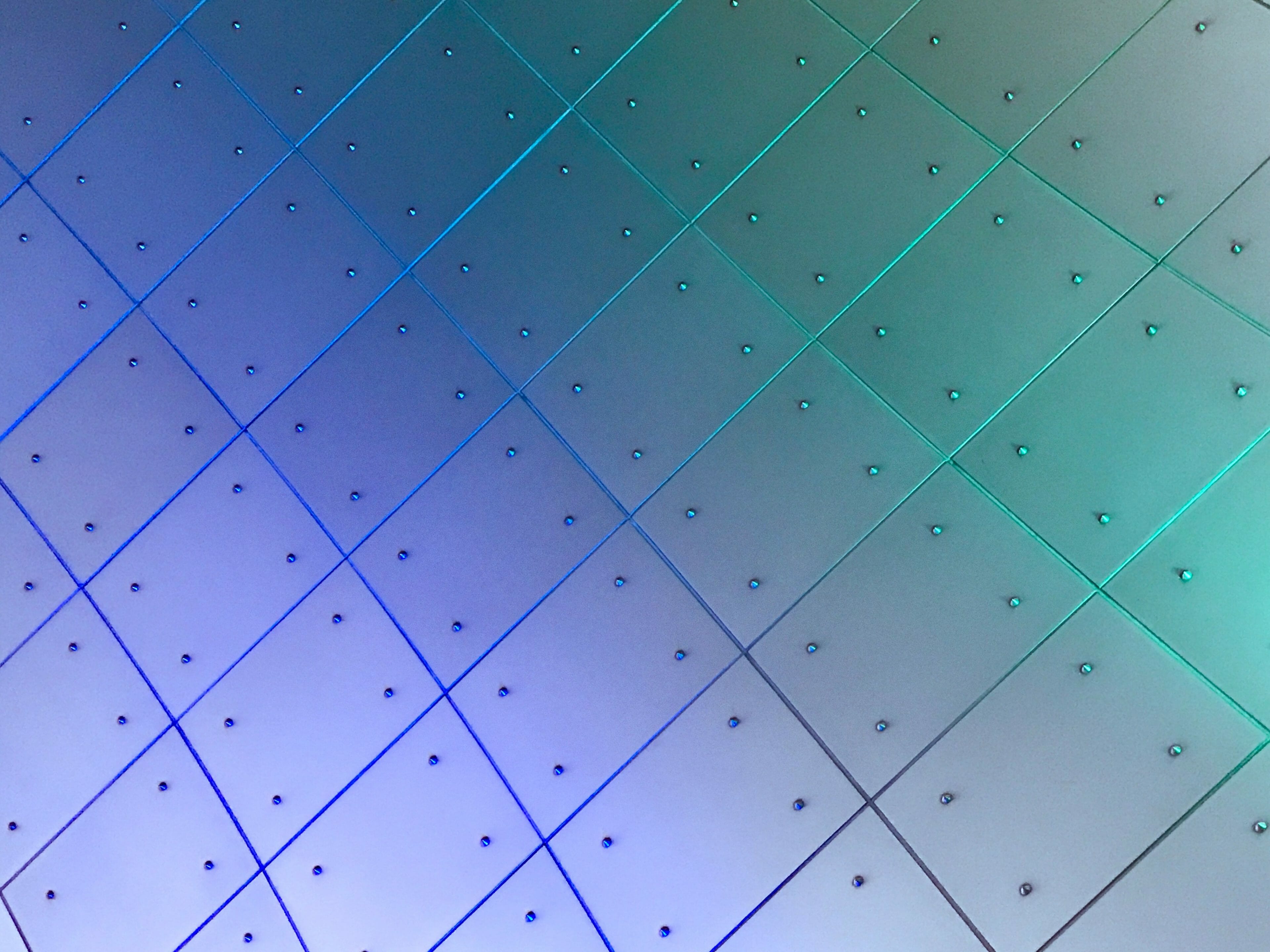 Abstract image of boxes with color gradient from purple/blue to green